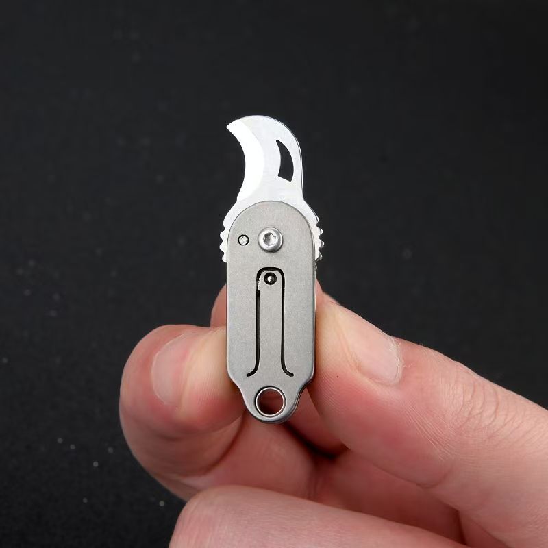 MINI Titanium Alloy Folding Kn - огляд і ціна Storage